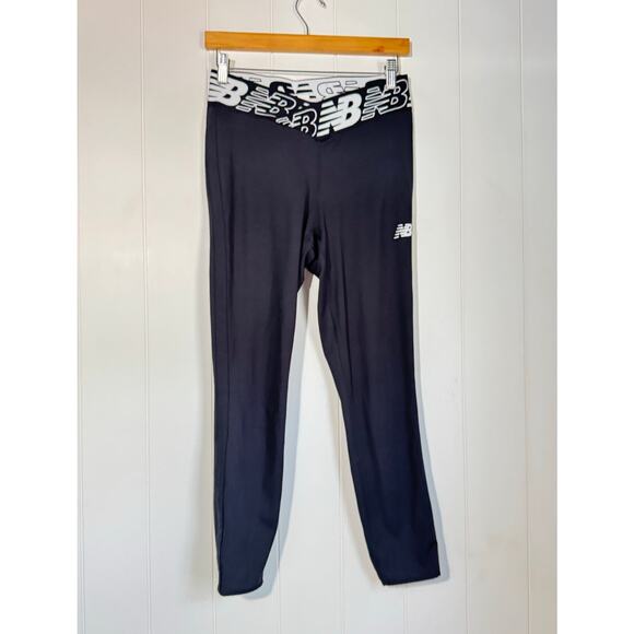 New Balance | Relentless Crossover High Rise Tight | Black Leggings | Medium - Picture 1 of 11